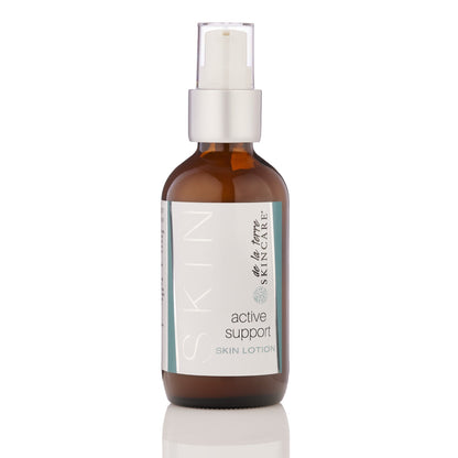 De La Terre Skincare Active Support Skin Lotion in amber glass bottle with pump, plant-based lotion designed to support the skin barrier and overall skin resilience.