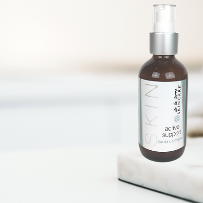 Active Support Skin Lotion by De La Terre Skincare displayed on a marble surface, a biology-informed, plant-based lotion formulated to support the skin’s natural barrier and recovery.