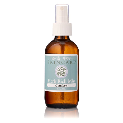 “Herb Rich Mist Supports by De La Terre Skincare in amber glass spray bottle”