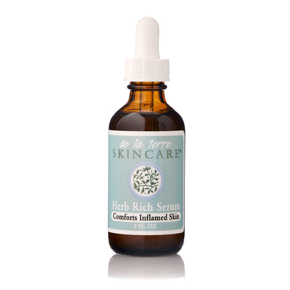 “De La Terre Skincare Herb Rich Serum in amber glass dropper bottle with white cap on white background”
