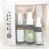 “Purifies Daily Essential Kit with three Herb Rich skincare bottles packaged in a De La Terre Skincare zip pouch”