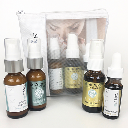 “Rescues Daily Essential Kit featuring three Herb Rich skincare treatments in a breathable De La Terre Skincare travel pouch”
