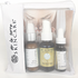 “Purifies Daily Essential Kit with three Herb Rich skincare bottles packaged in a De La Terre Skincare zip pouch”